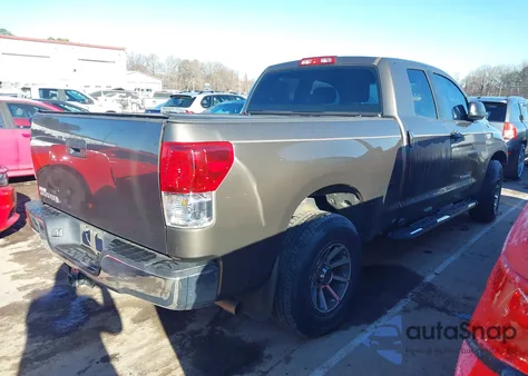 2011 Toyota Tundra Grade 5.7L V8 z USA, uszkodzony, nr VIN 5TFRY5F10BX111705